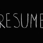 Blackboard with the word 'Resume' written in chalk. Ideal for educational or conceptual themes.